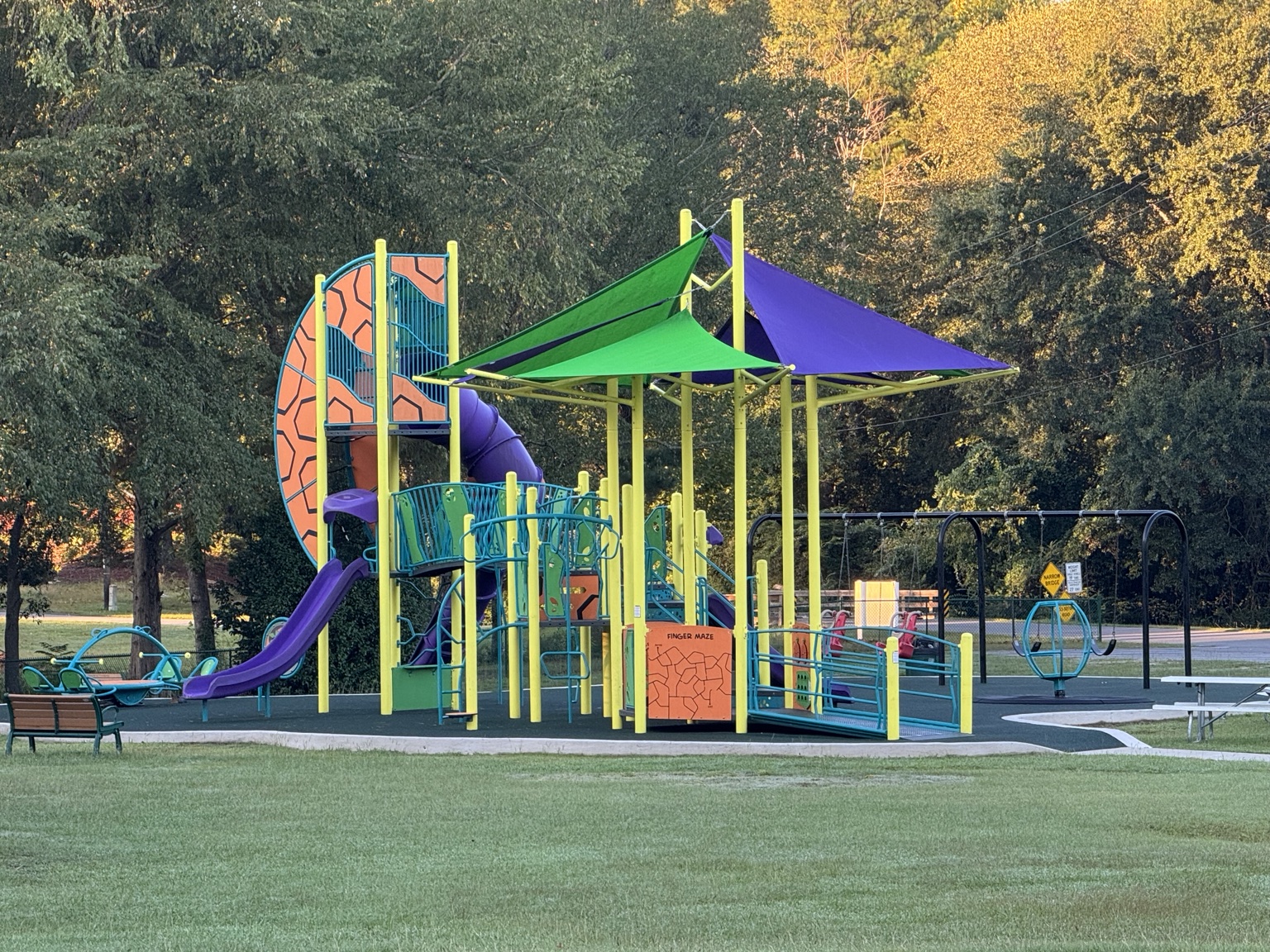 Colorful playground, swings, and shade sails in Aberdeen