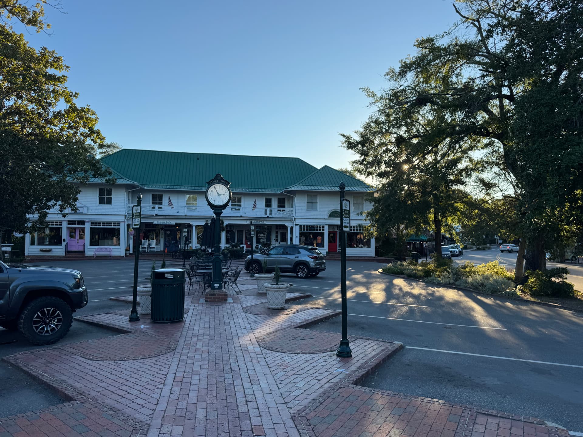 Village clock and shops along the brick sidewalks of Pinehurst