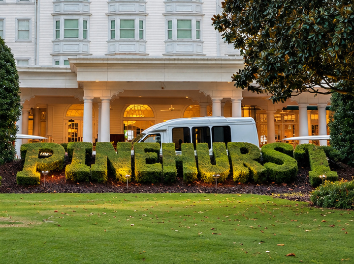 PINEHURST topiary sign in front of the Carolina Hotel at evening