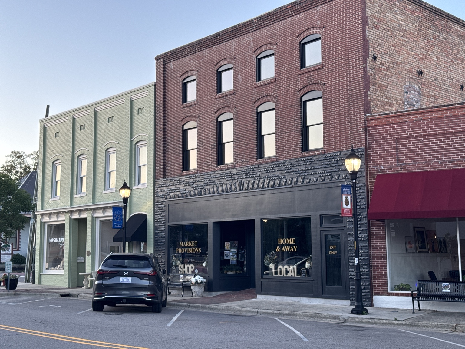 Historic brick storefronts on a corner block in downtown Aberdeen